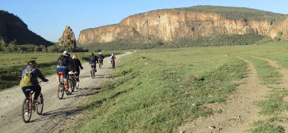 Red rock cliffs and open plains in Hell's Gate National Park, Kenya